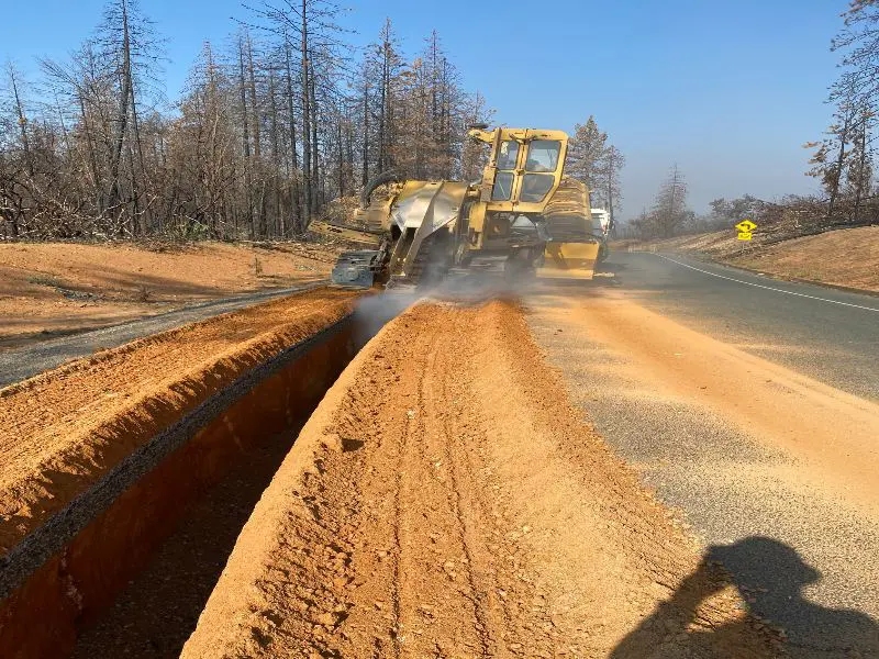 Road construction machinery in activity